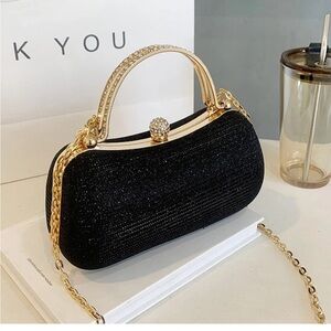 Elegant Black Evening Bag with Gold Accents